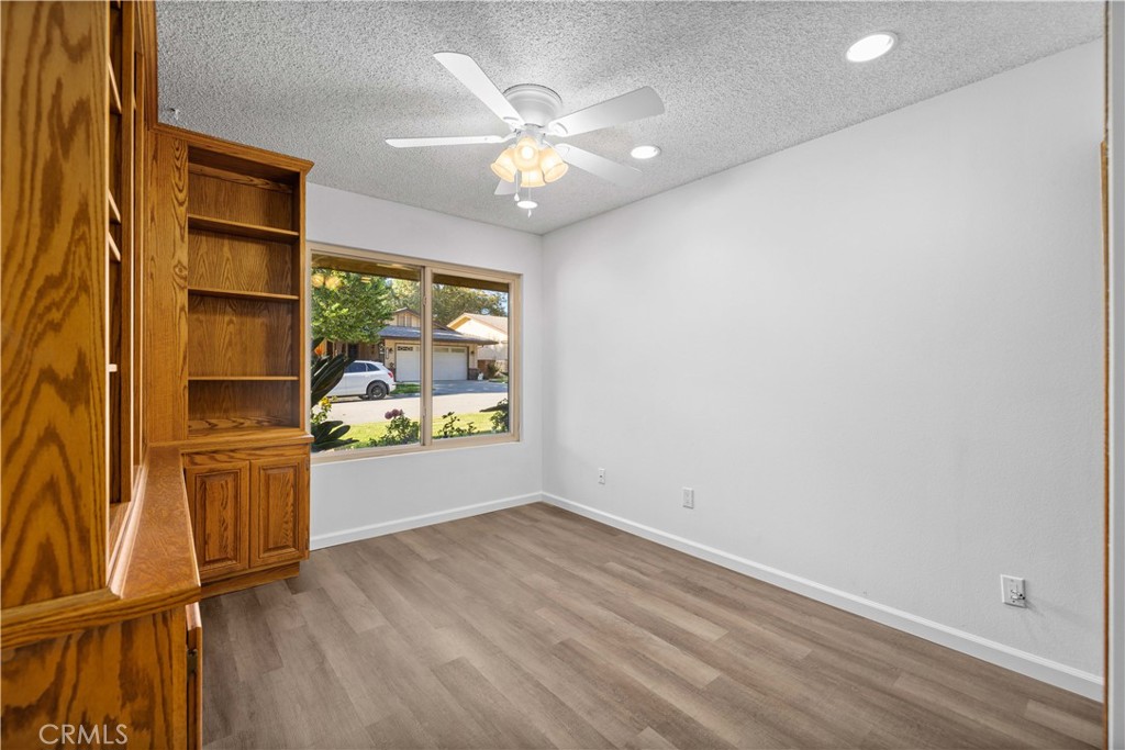 26562 Cardwick Court Newhall, CA 91321 - Photo 20 of 34 wooden floor in an empty room with a window
