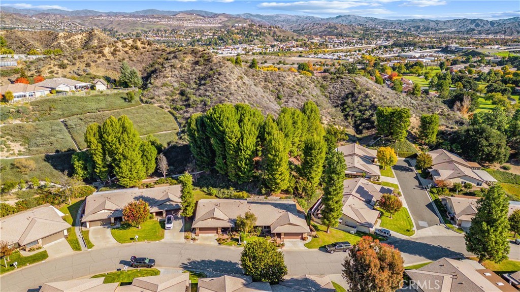 26562 Cardwick Court Newhall, CA 91321 - Photo 28 of 34 an aerial view of residential houses with outdoor space
