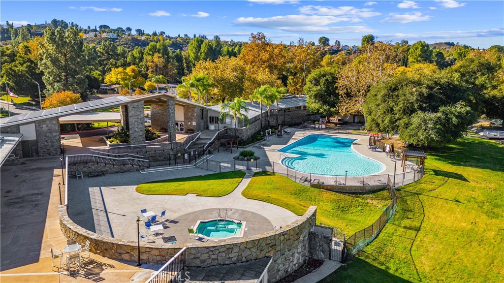 26562 Cardwick Court Newhall, CA 91321 - Photo 32 of 34 an aerial view of a swimming pool with a yard and furniture
