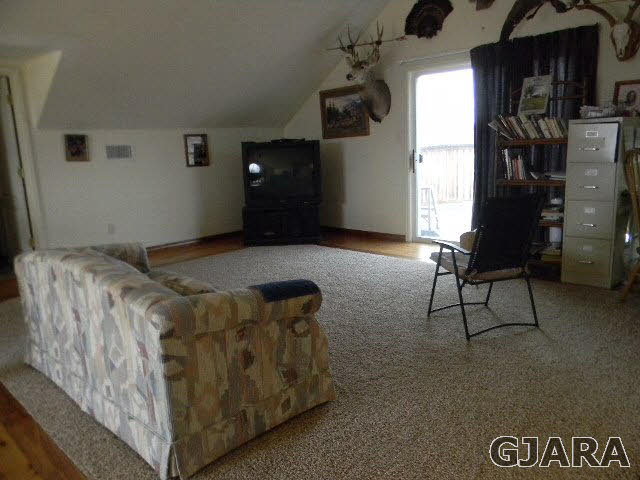 1712 North 3/10 Road Fruita, CO 81521 - Photo 13 of 34 a living room with furniture
