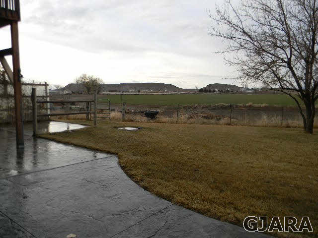 1712 North 3/10 Road Fruita, CO 81521 - Photo 21 of 34 a view of a lake with houses