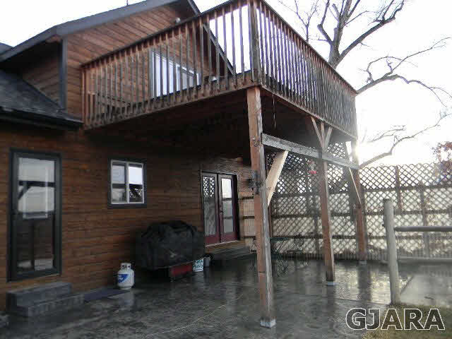1712 North 3/10 Road Fruita, CO 81521 - Photo 23 of 34 a front view of a house with outdoor seating