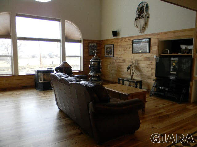 1712 North 3/10 Road Fruita, CO 81521 - Photo 4 of 34 a living room with furniture and large window