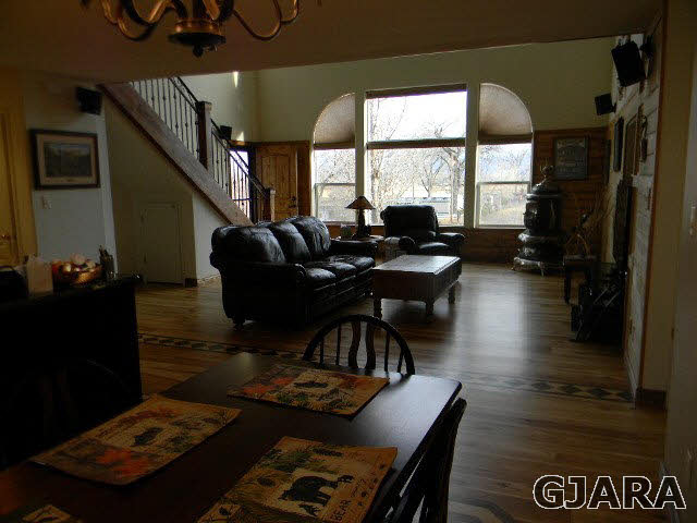 1712 North 3/10 Road Fruita, CO 81521 - Photo 6 of 34 a living room with furniture and a large window