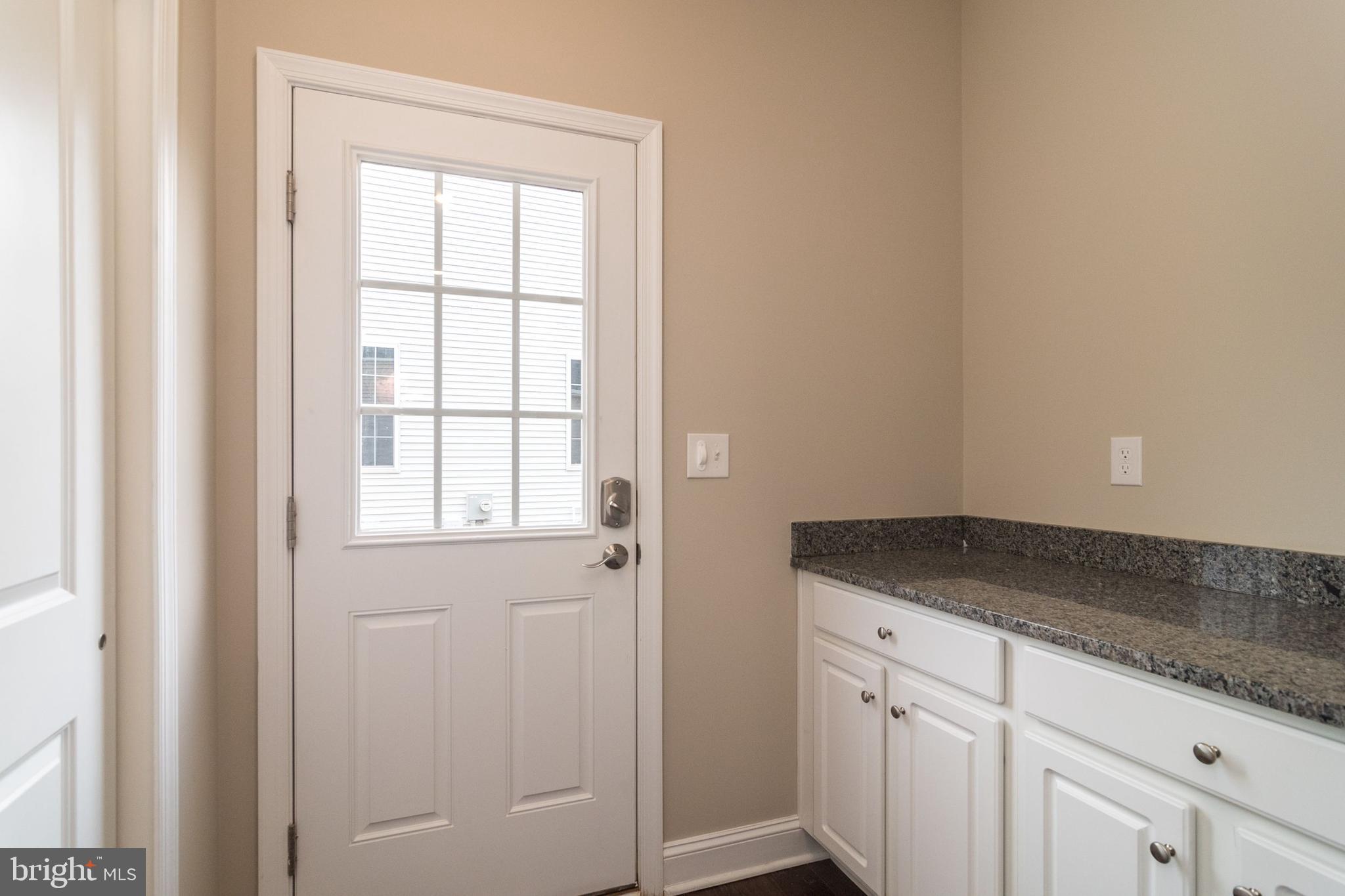 49 Metka Road Royersford, PA 19468 - Photo 24 of 42 Side Entrance with Closet & Granite Storage Area.
