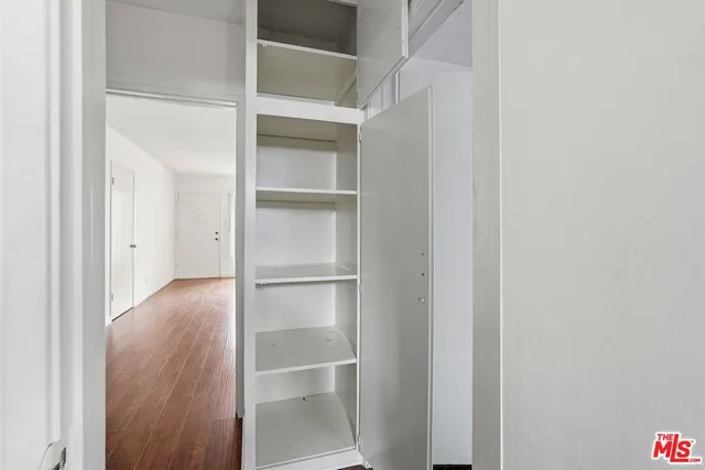 a view of an empty walk in closet