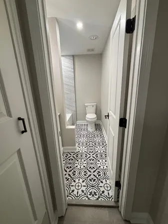a bathroom with a bathtub and shower