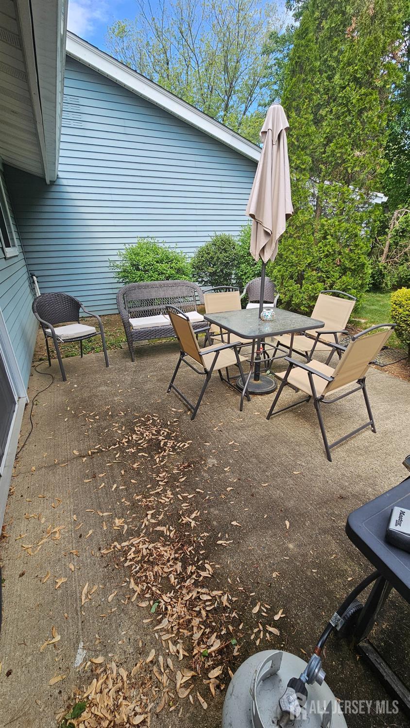 449 B Closter Road, Unit B Monroe Township, NJ 08831 - Photo 14 of 14 a view of backyard with outdoor seating