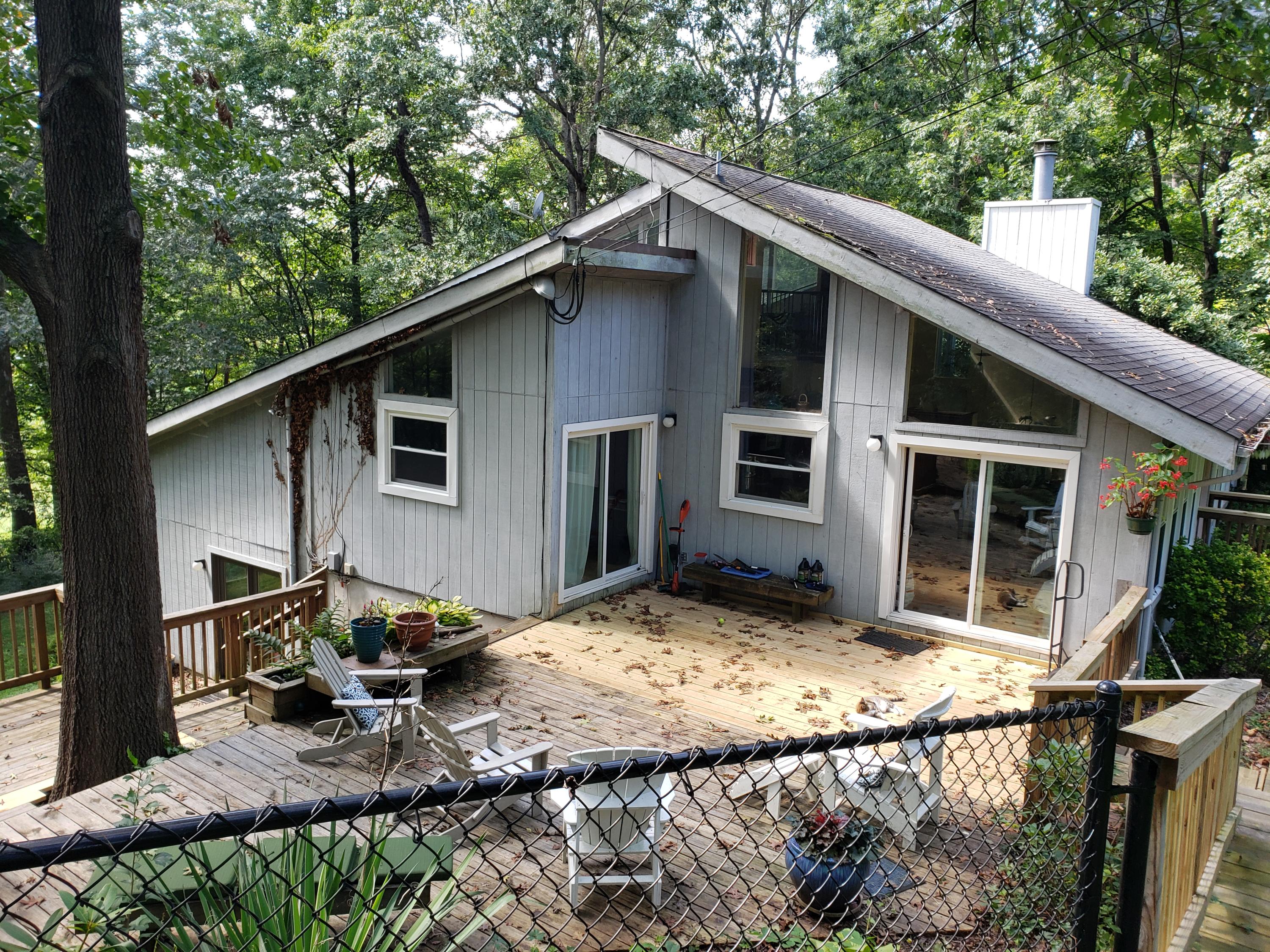 4616 Rosecrest Road Roanoke, VA 24018 - Photo 1 of 1 a backyard of a house with seating space