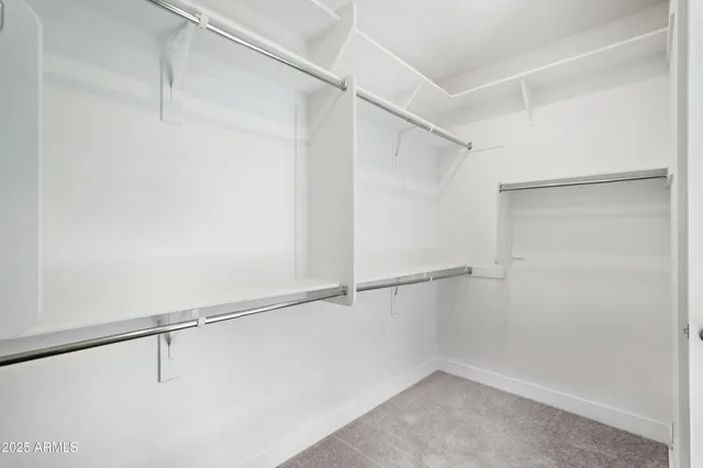 a view of an empty walk in closet