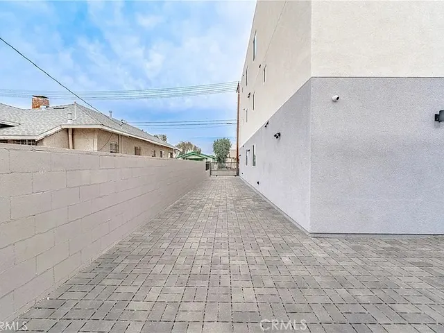 a view of a back yard of the house