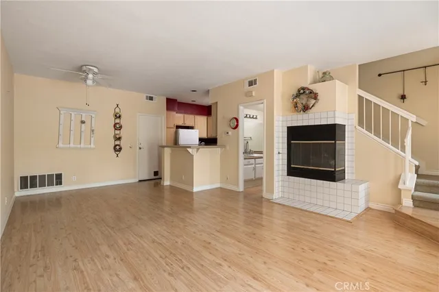 a view of a livingroom with wooden floor