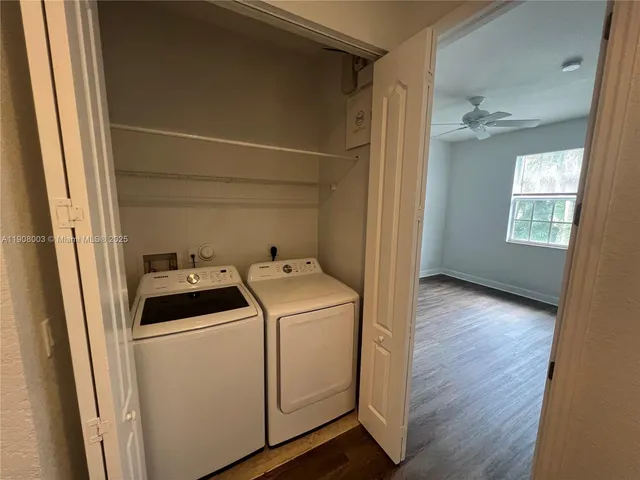 a utility room with dryer and washer