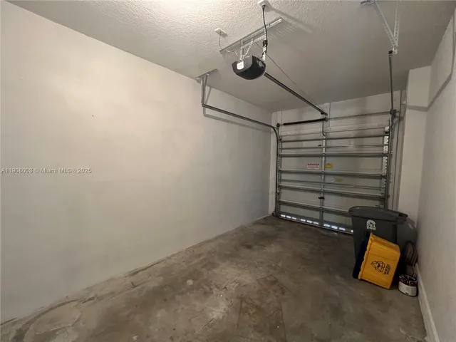 a view of a room with storage and racks on the wall