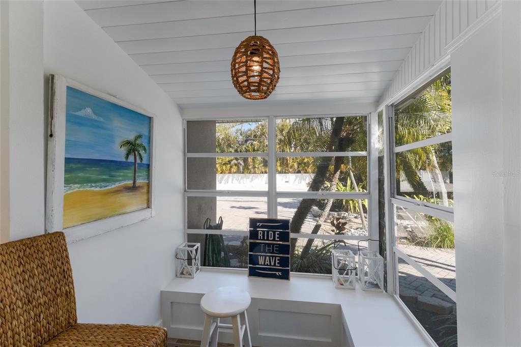 419 Clark Drive Holmes Beach, FL 34217 - Photo 21 of 53 a view of a dining room with furniture window and outside view