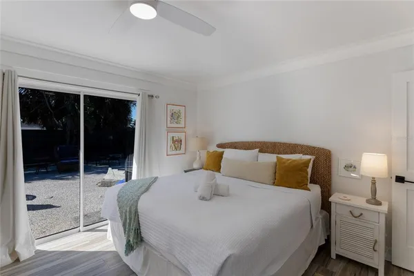 a bedroom with furniture and a book shelf