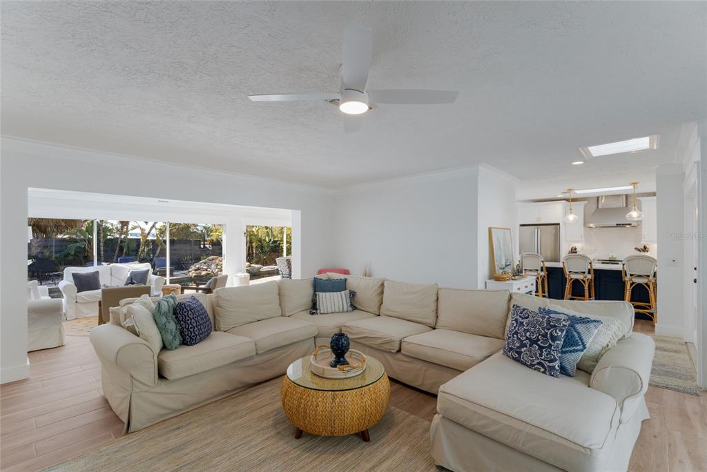 419 Clark Drive Holmes Beach, FL 34217 - Photo 3 of 53 a living room with furniture and a large window