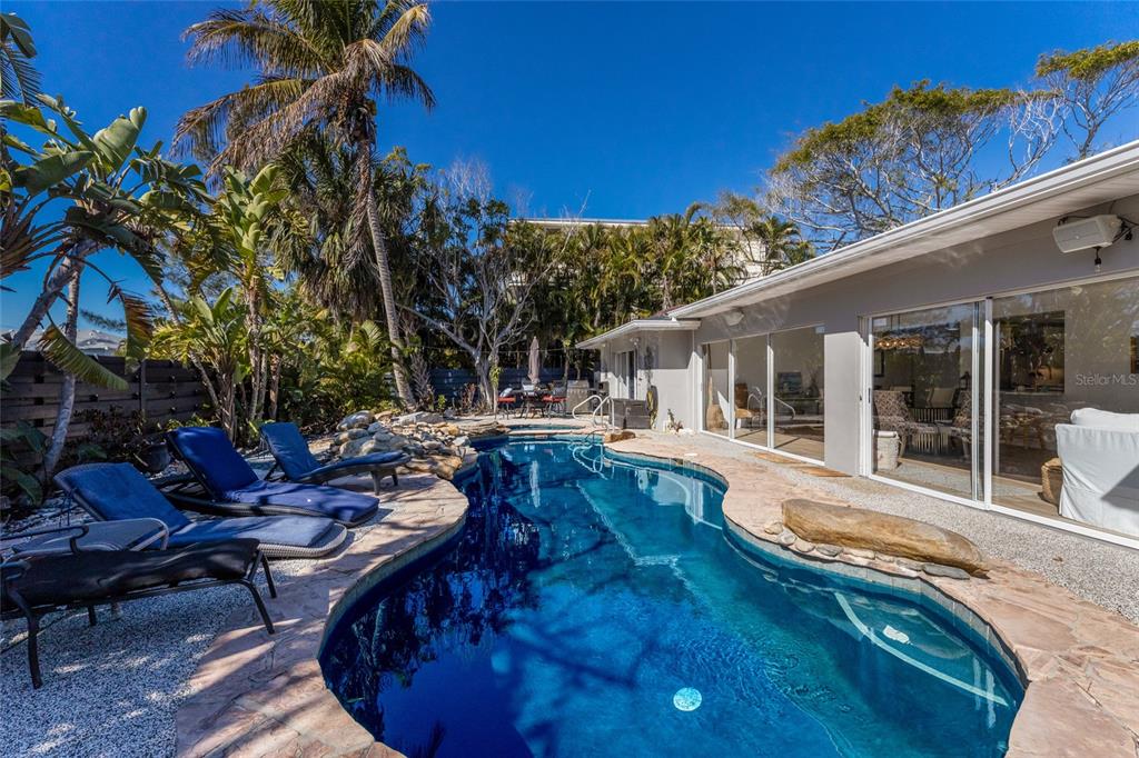 419 Clark Drive Holmes Beach, FL 34217 - Photo 33 of 53 a view of a house with backyard and sitting area