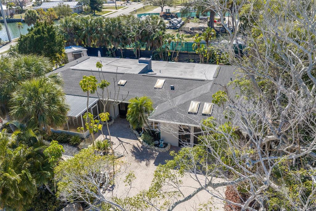 419 Clark Drive Holmes Beach, FL 34217 - Photo 46 of 53 an aerial view of a house with yard swimming pool and outdoor seating