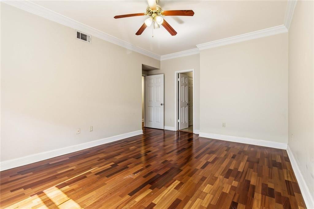 3777 Peachtree Road Northeast, Unit 533 Brookhaven, GA 30319 - Photo 11 of 30 wooden floor in an empty room