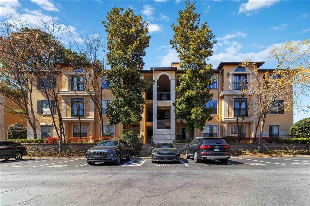 3777 Peachtree Road Northeast, Unit 533 Brookhaven, GA 30319 - Photo 22 of 30 a car parked in front of a building