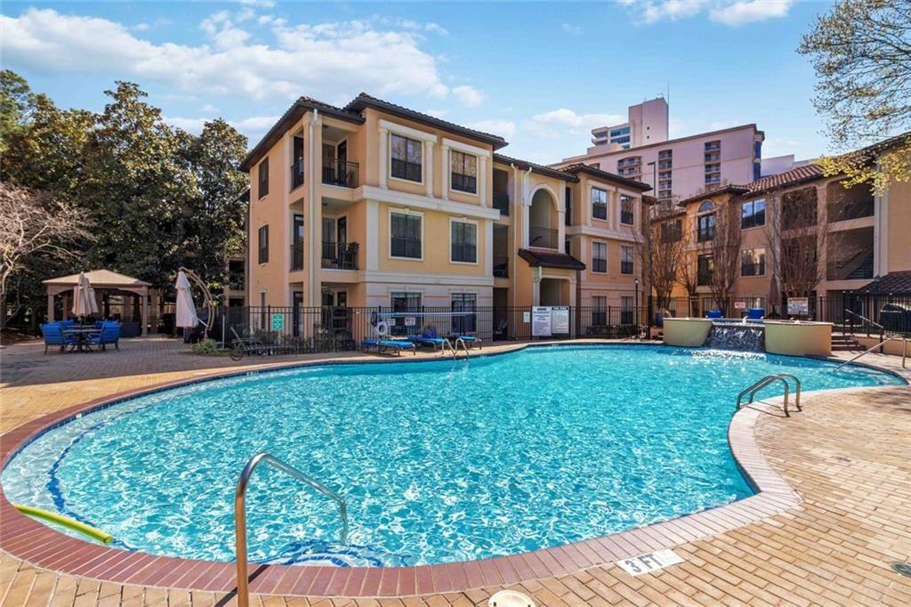 3777 Peachtree Road Northeast, Unit 533 Brookhaven, GA 30319 - Photo 29 of 30 a view of a building with a yard