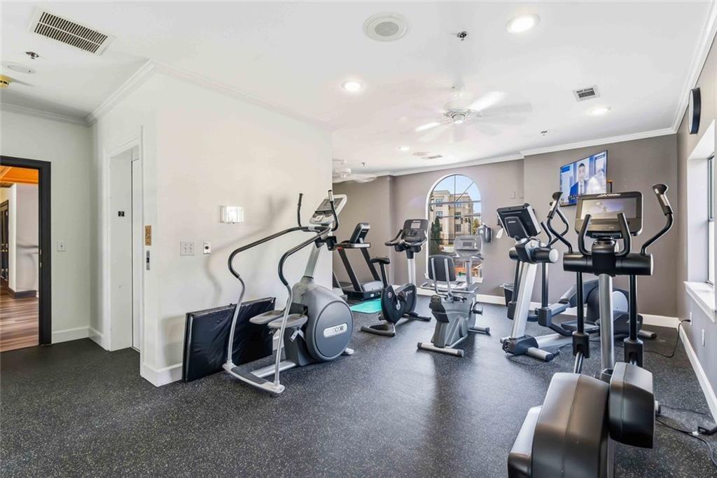 3777 Peachtree Road Northeast, Unit 533 Brookhaven, GA 30319 - Photo 7 of 30 a view of a room with gym equipment
