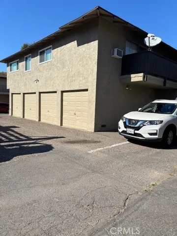 a car parked in front of a house
