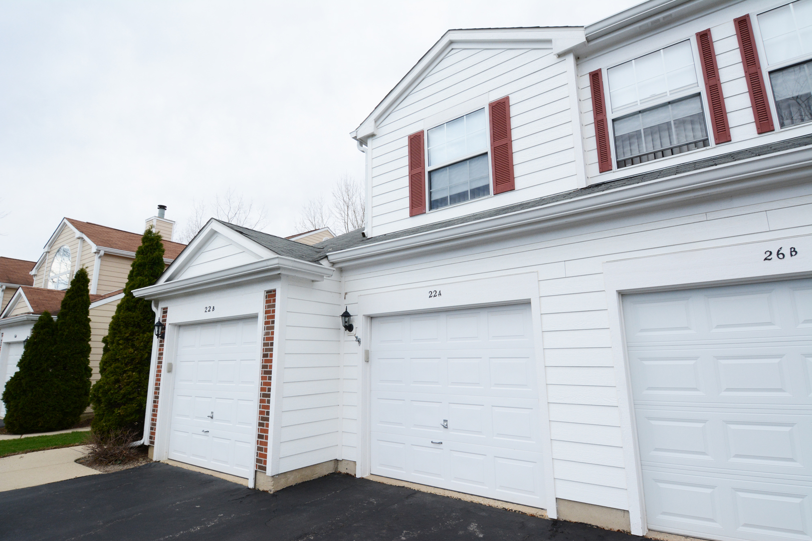 22 Tyler Court, Unit A Streamwood, IL 60107 - Photo 1 of 27 front view of a house