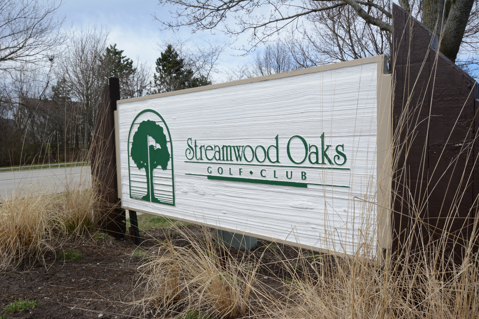 22 Tyler Court, Unit A Streamwood, IL 60107 - Photo 22 of 27 a sign that is on the side of a building