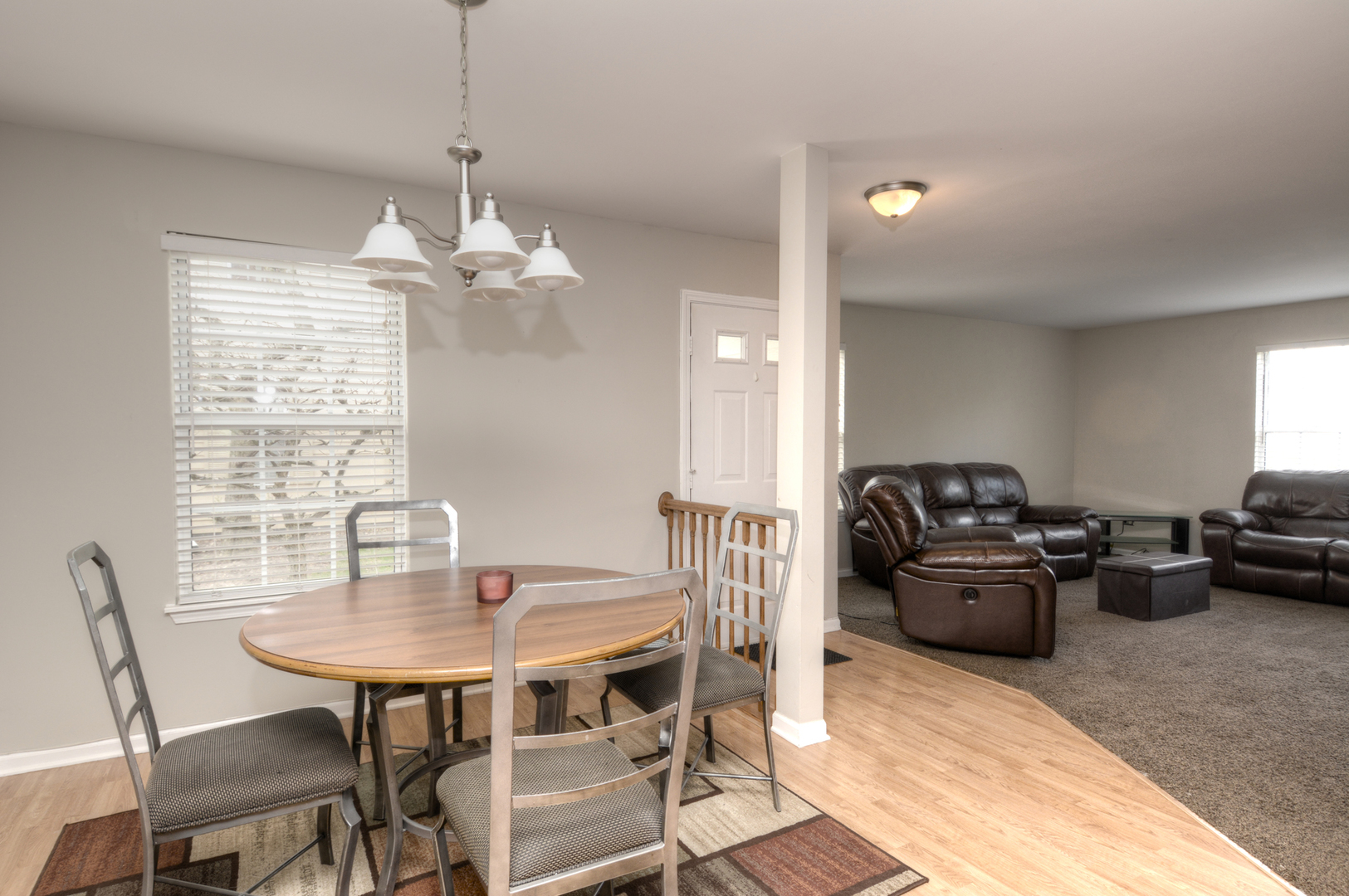 22 Tyler Court, Unit A Streamwood, IL 60107 - Photo 7 of 27 a view of a dining room with furniture window and outside view