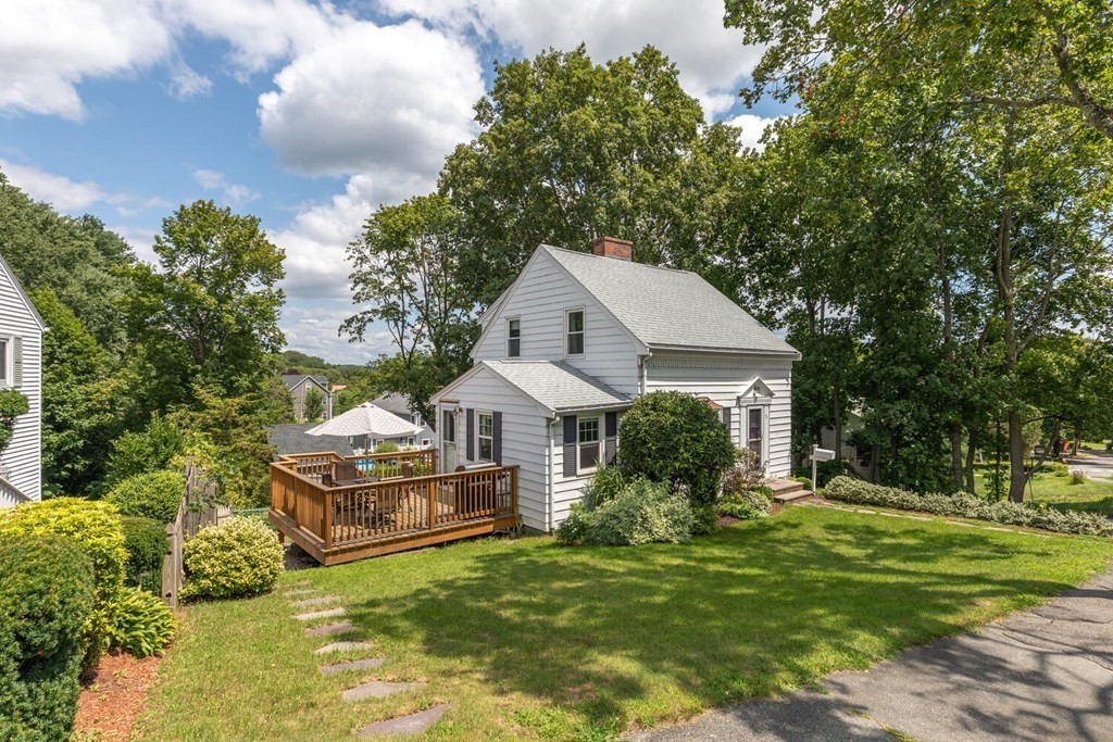 51 Ridge Street Arlington, MA 02474 - Photo 22 of 28 a front view of a house with garden