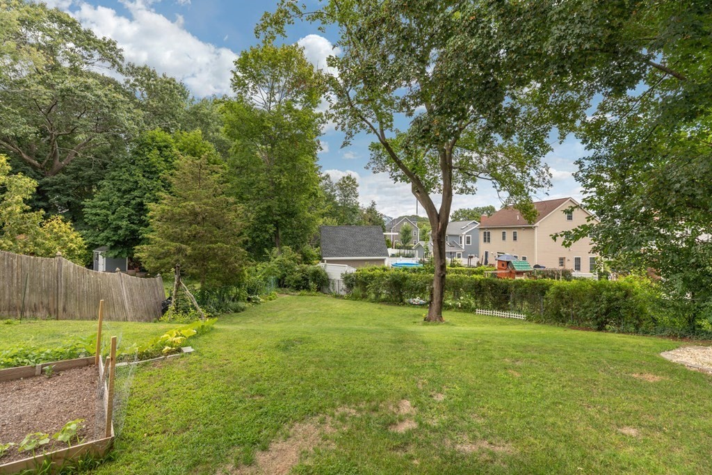 51 Ridge Street Arlington, MA 02474 - Photo 24 of 28 a view of a house with backyard