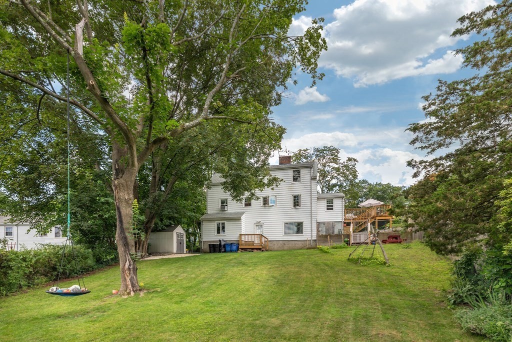 51 Ridge Street Arlington, MA 02474 - Photo 25 of 28 a view of a house with backyard