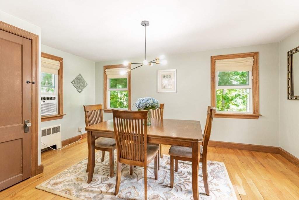 51 Ridge Street Arlington, MA 02474 - Photo 6 of 28 a view of a dining room with furniture window and outside view
