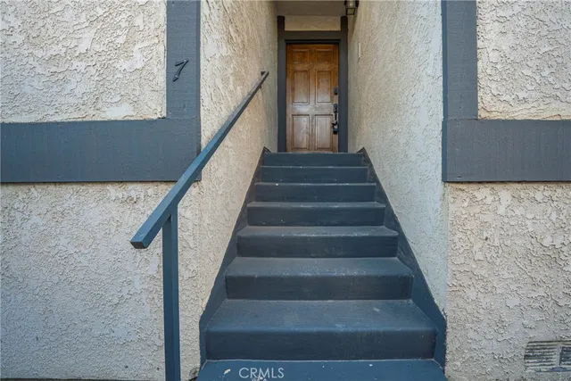 a view of a building with a street