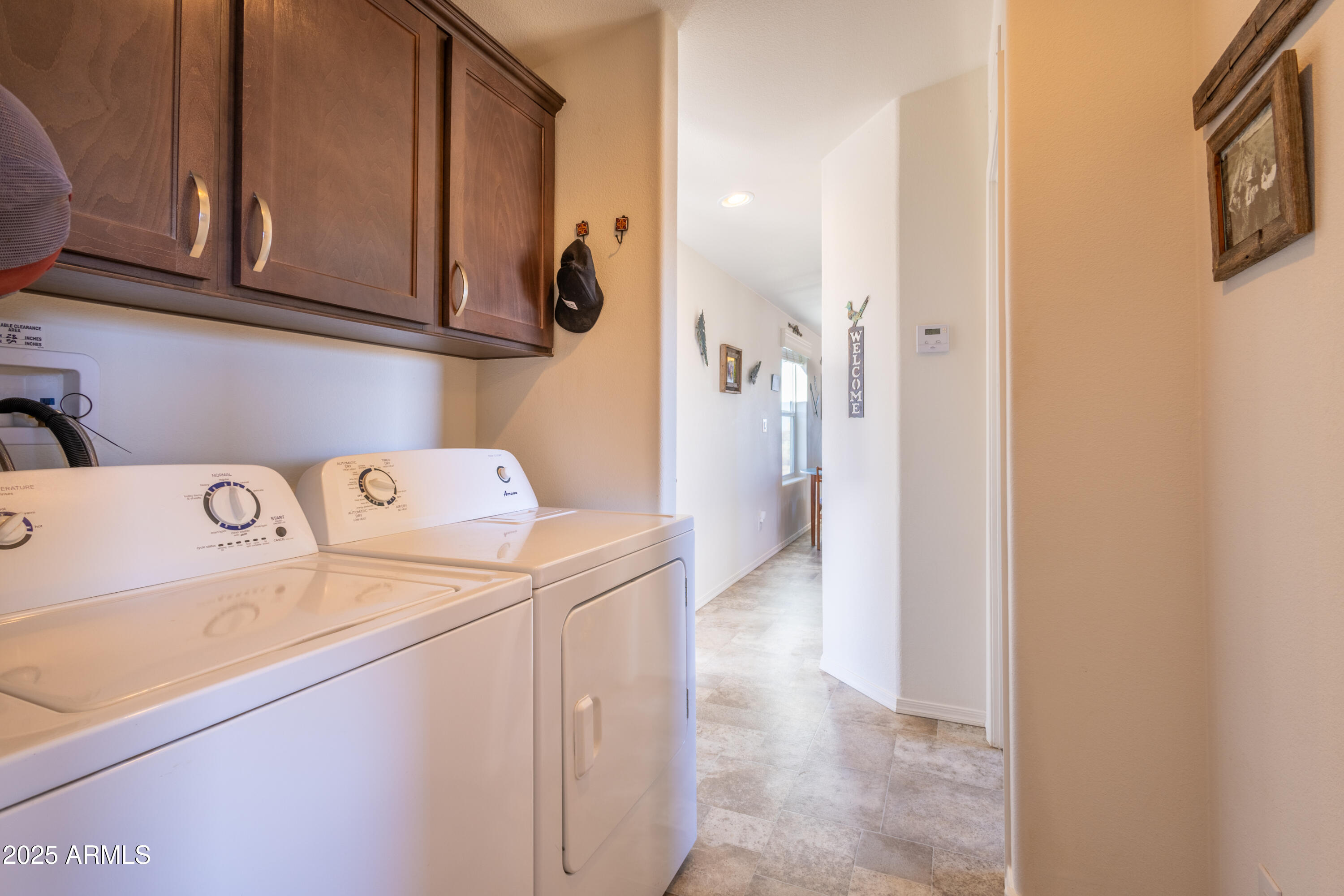 45409 West Luray Road Wickenburg, AZ 85390 - Photo 14 of 26 a utility room with dryer and washer