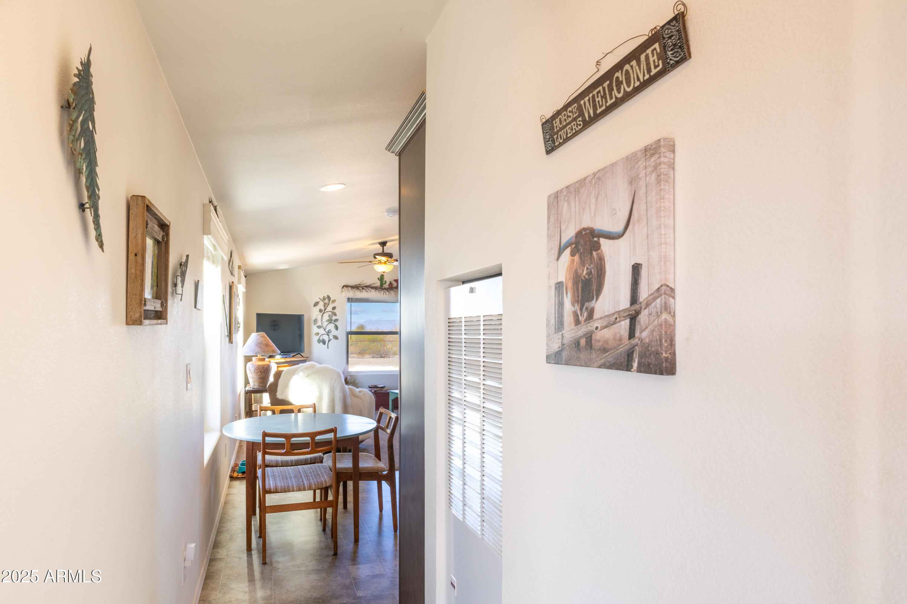 45409 West Luray Road Wickenburg, AZ 85390 - Photo 15 of 26 a dining room with furniture and wooden floor