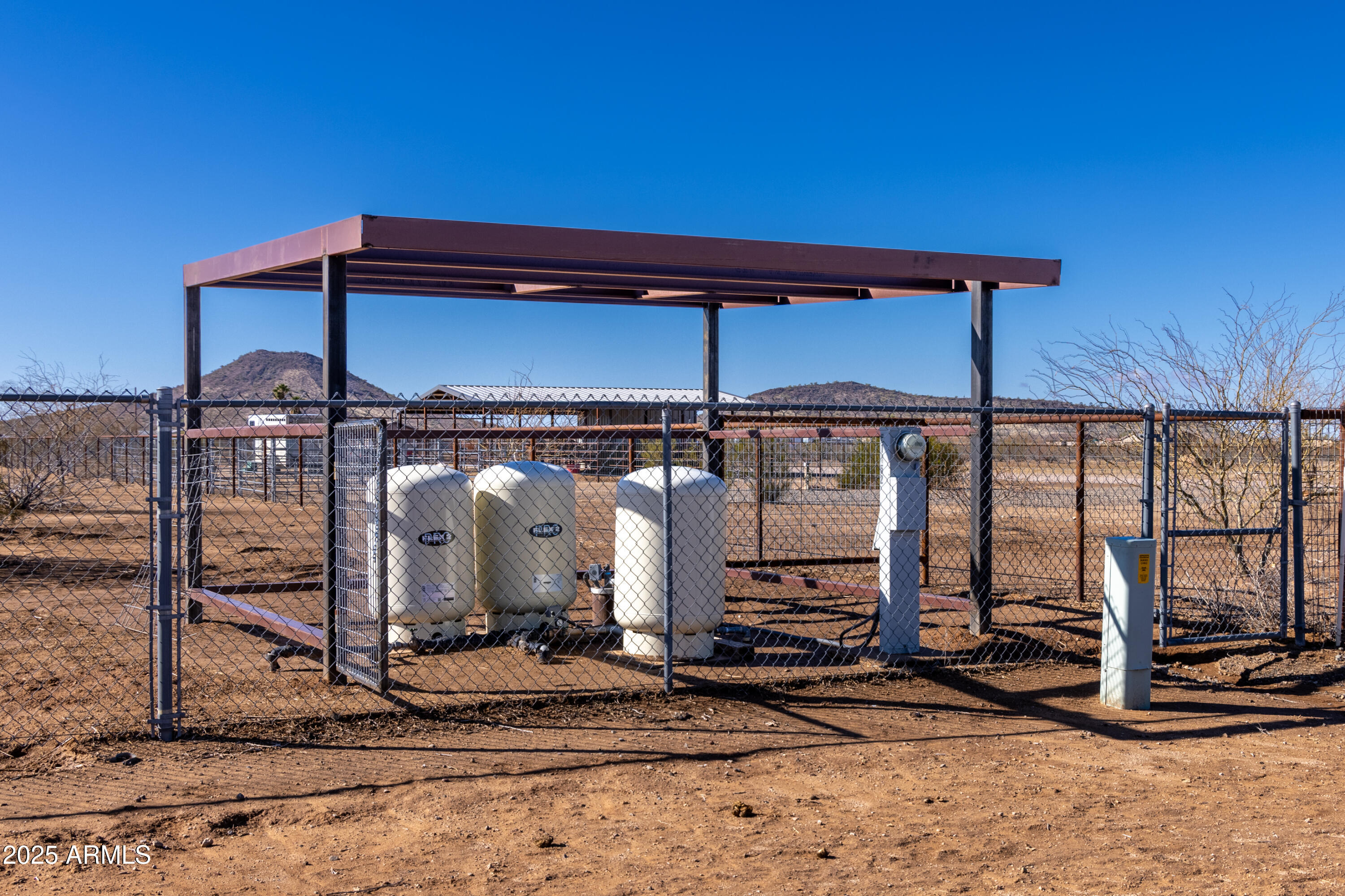 45409 West Luray Road Wickenburg, AZ 85390 - Photo 21 of 26 a front view of a house with street