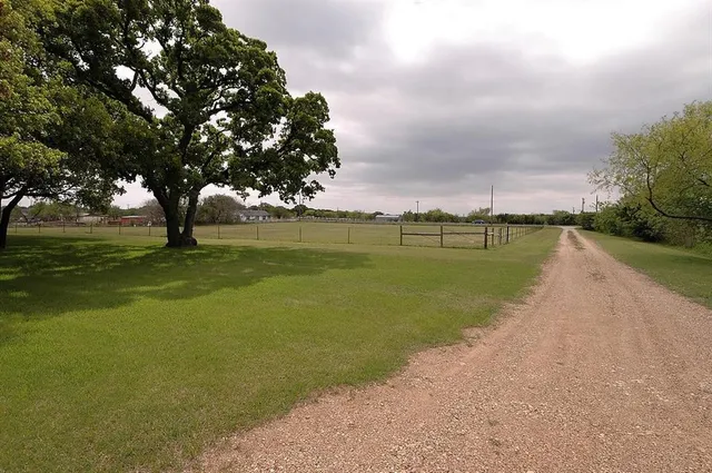 a view of a lake with a big yard