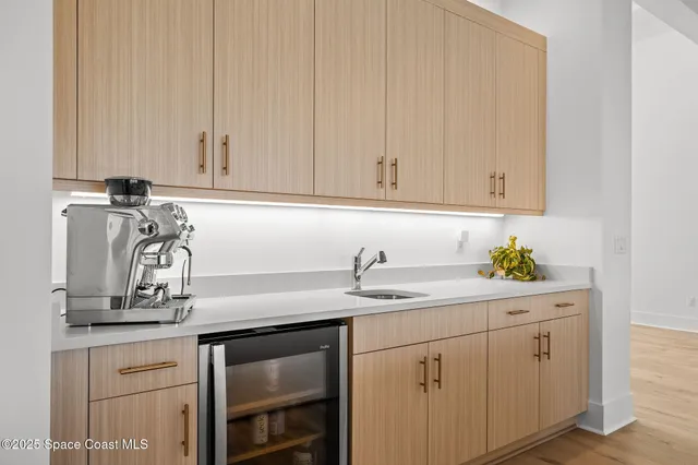 a view of a dining room with furniture and window