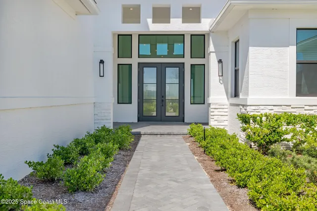 a view of a swimming pool with an outdoor seating