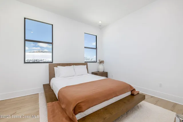 an aerial view of a swimming pool and outdoor space