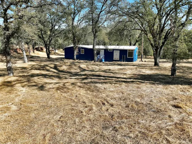 a house view with a outdoor space