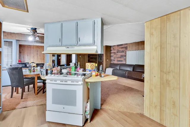 a view of an empty room with windows