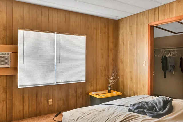 a view of a room with a wooden walls