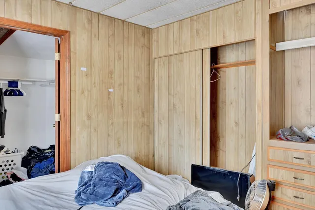 a bathroom with a tub and a sink