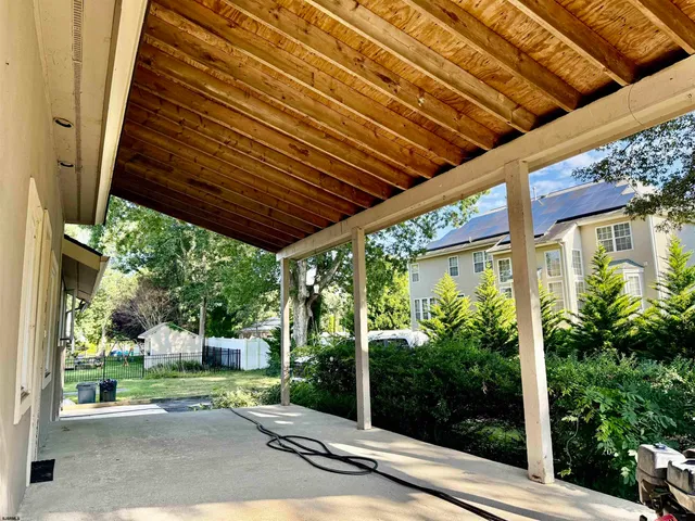 a porch with view of outdoor space