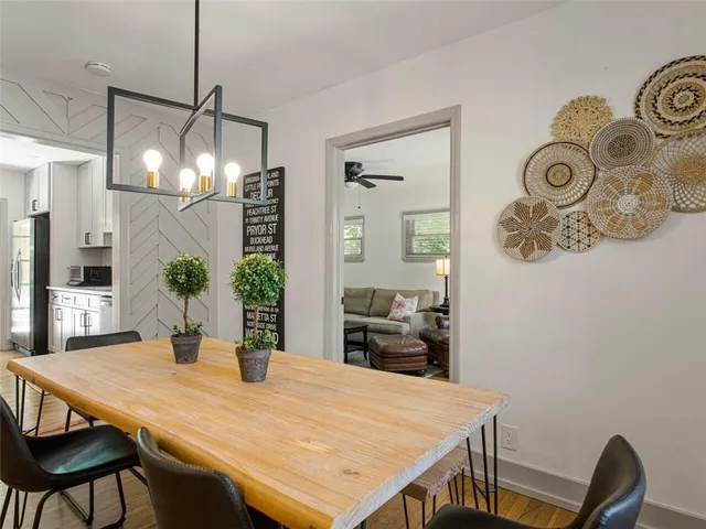 a view of a dining room and a table