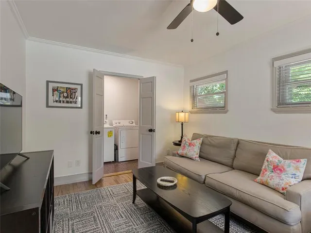 a living room with furniture and a couch